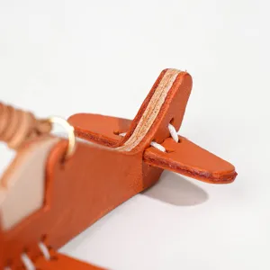 Vegetable-tanned leather 3D airplane keychain charm, top layer cowhide bag pendant ornament.