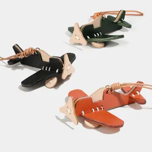 Vegetable-tanned leather airplane bag charm, cute 3D key chain pendant, genuine cowhide.