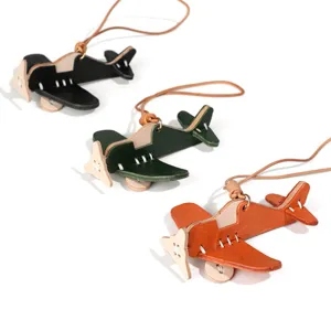 Genuine leather airplane keychain and cute bag charm pendant, perfect handmade car hanging ornament.