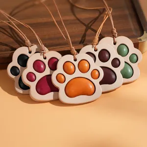 Cute leather cat paw pendant for car rearview mirror, genuine cowhide bag charm decoration.