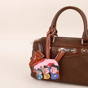 Brown PU leather handbag featuring a cute horse pendant and metal brand logo for daily style.