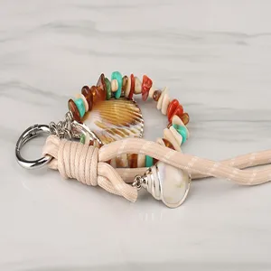 Boho style beaded shell keychain lanyard charm accessory for bags, keys and phone decoration.