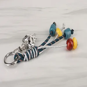 Colorful woven keychain lanyard with multi-color beads and metal ring for daily use.