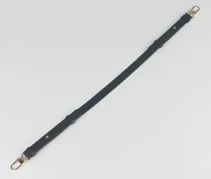 Adjustable black leather replacement shoulder strap detail with gold metal hardware clasps.