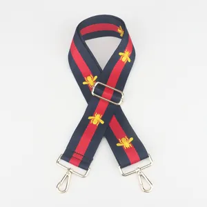 Vervangende tasriem breed verstelbaar schouderband blauw rood gestreept bije borduurwerk