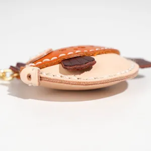 Handgemaakt vegetabel gelooid lederen kogelvis sleutelhanger schattige auto tas hanger hoofdfoto.