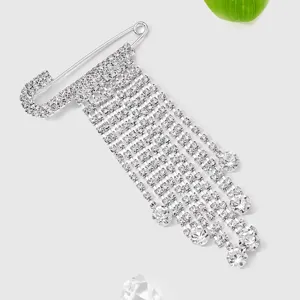 Elegant silver rhinestone safety pin tassel brooch for women, sparkling crystal fashion jewelry accessory.