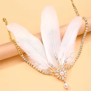 Vintage feather rhinestone headband Gatsby party hair accessory with pearls and crystal chains.