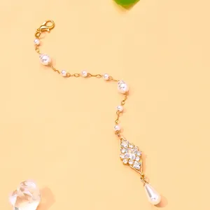 Exquisite Indian style pearl brow pendant hair chain forehead ornament for wedding party.