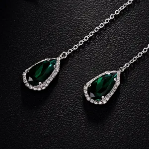 Catena da viso con cristallo verde goccia e nappa orecchini gioielli eleganti donna.