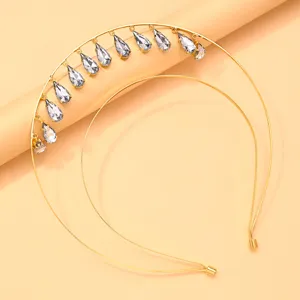 Gorgeous double layer gold headband with sparkling teardrop crystal charms for women.