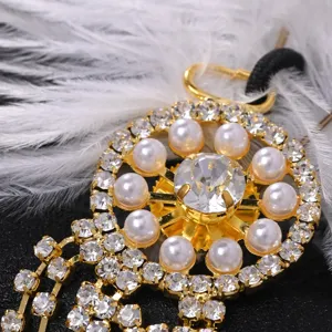 Vintage 1920s Gatsby rhinestone pearl feather headpiece accessory detail shot close-up