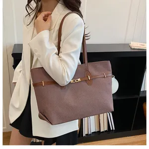 Detail view of a vintage large-capacity shoulder tote bag with elegant brown texture and hardware.