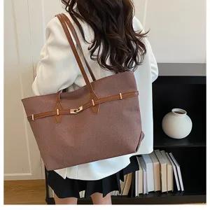 Vintage large capacity tote bag, stylish commuter shoulder bag with chic strap design.