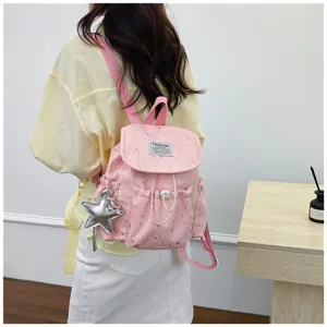 Süßer rosa Mini Rucksack für Damen, Sternenmuster Schultasche mit niedlichem Sternanhänger.