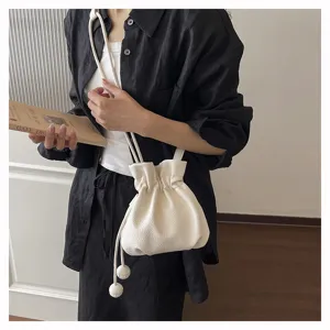 Sac seau a cordon unicolore pour femme, sac bandouliere en cuir chic pour travail.