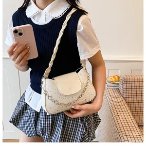 French style stylish underarm shoulder bag with star pattern and chain strap for women.