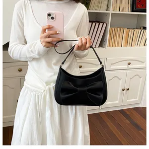 Black crescent shoulder bag for women, trendy bow PU leather hobo bag, casual Korean underarm bag.