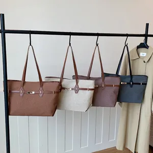 Vintage large capacity canvas shoulder tote bag, stylish commuting handbag for women.