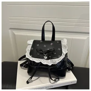 Zaino piccolo floreale nero con volant in pizzo e fiocco, borsa casual elegante per ragazze.