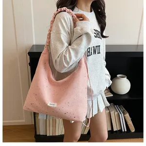 Casual pink hobo tote bag with star print and ruffled shoulder strap, stylish daily wear.