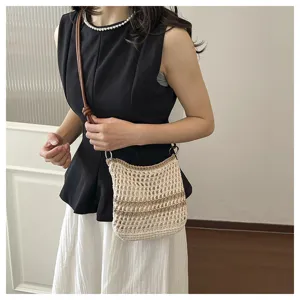 Handmade woven mini crossbody bag, chic knit phone bag for beach and casual daily use.