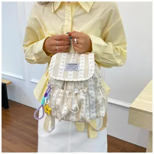 Japanese style cute bow pattern backpack detail, casual canvas school bag with front pocket.