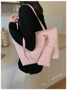 Detailansicht der rosa Stern-Print Tragetasche mit viel Stauraum und modischem Alltagsdesign.