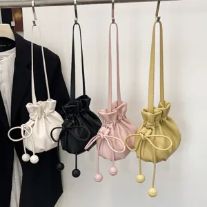 Sac seau tendance à cordon pour femme, élégant sac à bandoulière et porté épaule uni chic.