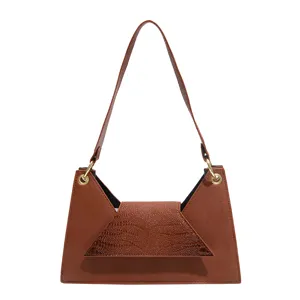 Chic brown shoulder bag for women, stylish faux leather handbag with flap and metallic rings.