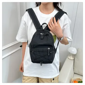 Casual black mini backpack for women and students, lightweight daily travel daypack.