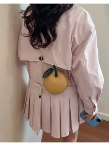 Niche design mini apple chain crossbody bag for women, cute yellow leather shoulder purse.