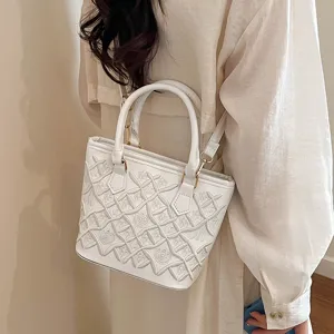 Stylish white women crossbody handbag, elegant PU leather shoulder tote bag for daily commute fashion.