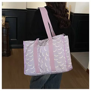 Gran bolso de lona morado con patrón de murciélago, bolso de deporte y viaje versátil para uso diario.
