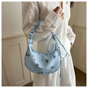 Borsa a tracolla azzurra con stampa di fiocchi, borsa casual elegante per donna e ragazza.