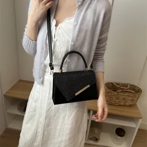 Black sequin evening handbag with top handle and crossbody strap for women stylish use