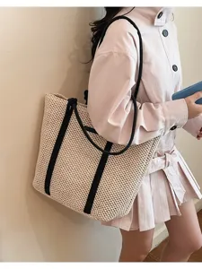 Stijlvolle holle touw stro geweven tote tas, grote capaciteit casual schouder strandtas voor.