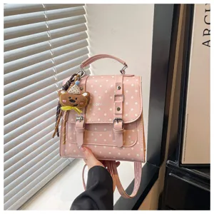 Zaino rosa a pois in stile coreano con ciondolo aorsetto carino per look quotidiano.