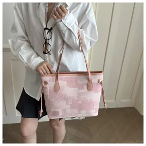 Rosa gemusterte Canvas-Tragetasche mit Ledergriffen und schicken Kordelzügen für Damen.