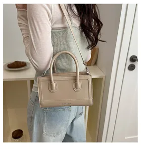 Niche vintage textured handbag crossbody bag, chic spliced small square bag for women's daily use.