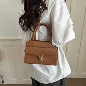 Elegante borsa a mano marrone in pelle da donna, ideale per il lavoro quotidiano e il tempo libero.