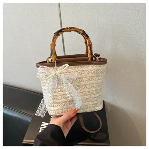 Trendy zomer stro emmer tas met bamboe handvat en parel kant strik voor vrouwen dagelijks.