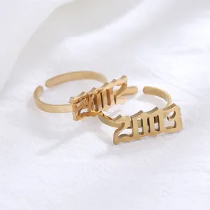 Stainless steel gothic year number ring detail shot showcasing the 2002 and 2003 design.
