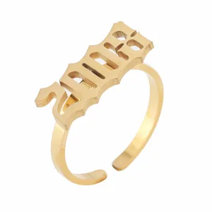 Stainless steel minimalist year ring with Gothic number cutout open band design for daily wear.