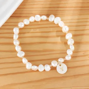 Freshwater pearl bracelet with letter Y pendant, elegant charm jewelry for women daily wear.