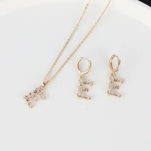 Gold letter E necklace and earrings jewelry set, chic bamboo texture pendant for women daily.