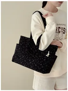 Schwarze Cord Umhängetasche für Damen, große Kapazität Schultertasche mit süßem Muster Design.