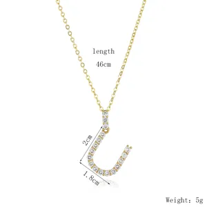 Gold letter J pendant necklace with sparkling cubic zirconia, elegant fashion jewelry piece.