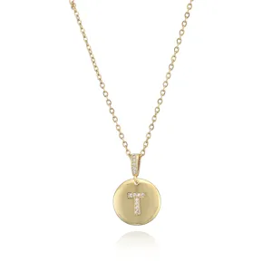 Gold-plated alphabet letter T necklace with crystal paved round pendant and delicate chain detail.