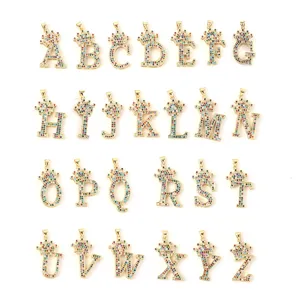 Colorful crystal crown alphabet letter pendants detail shot, premium gold plated charm set.